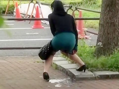 Beautiful Asian girl accidentally pisses in public